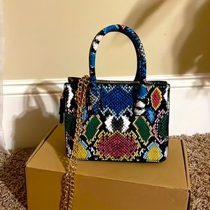 Brand new Multi color small bag with gold cross body chain